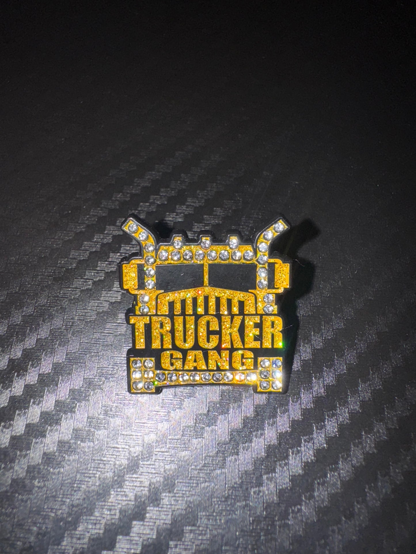 "GOLD ROLLIE TRUCKER"