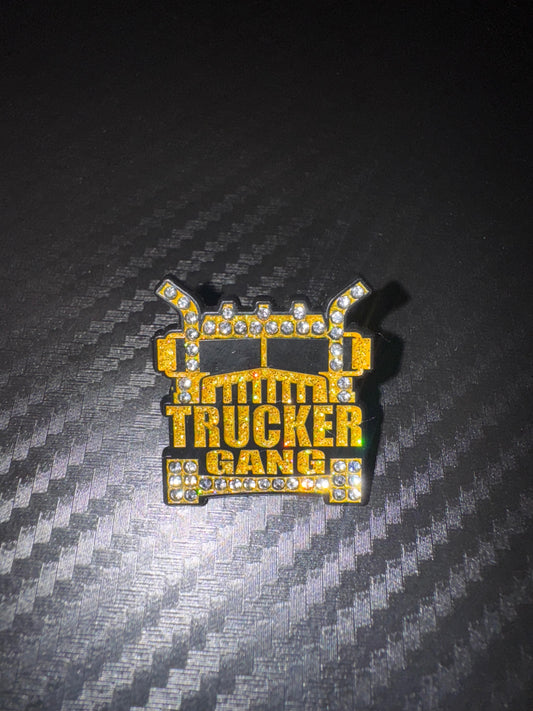 "GOLD ROLLIE TRUCKER"